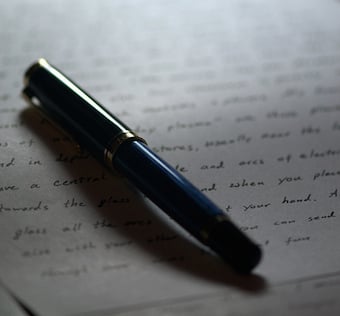 pen lying on paper