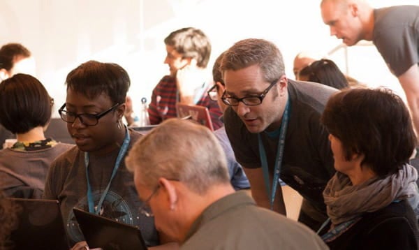 people using laptops at a WordCamp